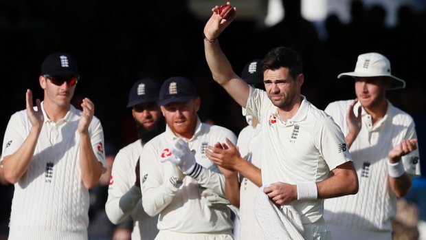 England's James Anderson celebrates taking his 500th test wicket on the second day of the third test match between England and the West Indies at Lord's. 