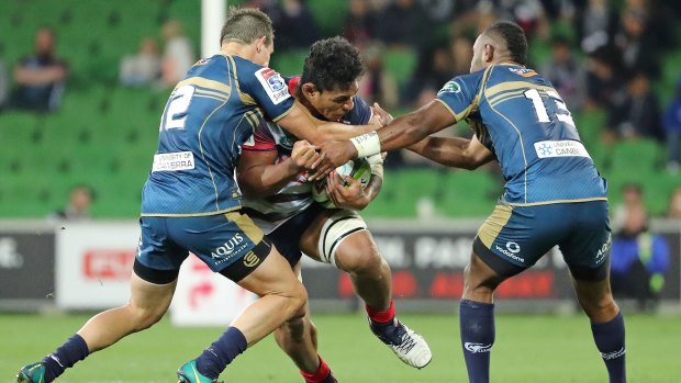 Time out: Lopeti Timani is stopped in his tracks by the Brumbies defence during round eight at AAMI Park.