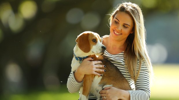 Dog owner and pet-insurance client Lucy Bland with her dog Hudson. 