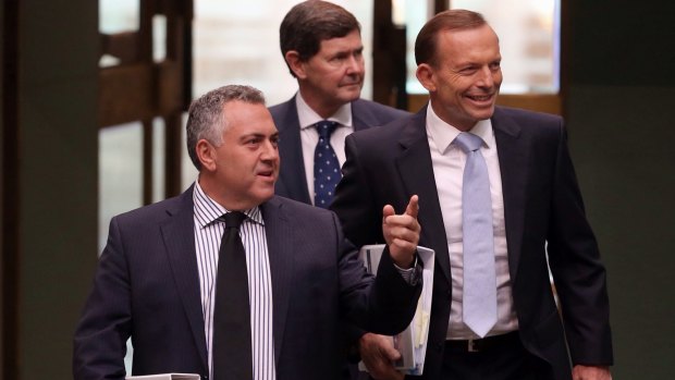 Treasurer Joe Hockey, with Prime Minister Tony Abbott and and Social Services Minister Kevin Andrews has defended the system of political donations.