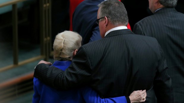 Coalition MP Ewen Jones walks out of the chamber with former Speaker Bronwyn Bishop after incoming Speaker Tony Smith was 'dragged' to the Speaker's chair.