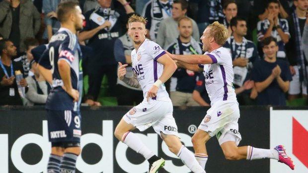 Andrew Keogh wheels away after scoring the opening goal in Glory's clash against Melbourne Victory.