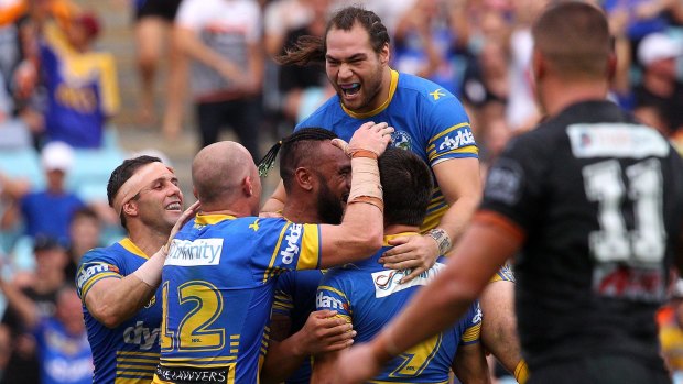 Junior Paulo of the Eels celebrates scoring a try during the round four NRL match between the Wests Tigers and the Parramatta Eels.
