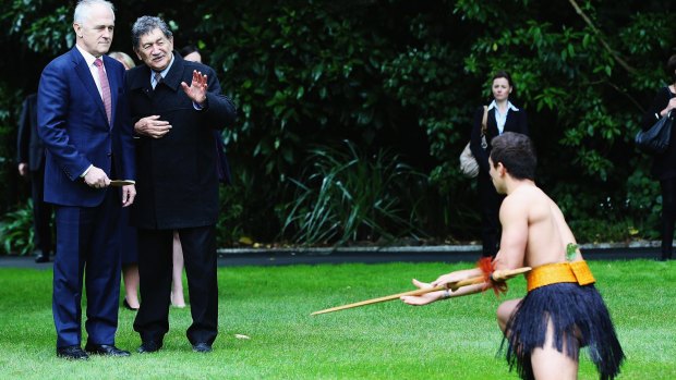 Malcolm Turnbull is welcomed in an official ceremony by a Maori warrior at Government House in Auckland.