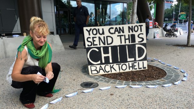 Scotia Monkivitch was one of about 50 protesters still at the vigil for baby Asha at Brisbane's Lady Cilento Hospital on Sunday morning.