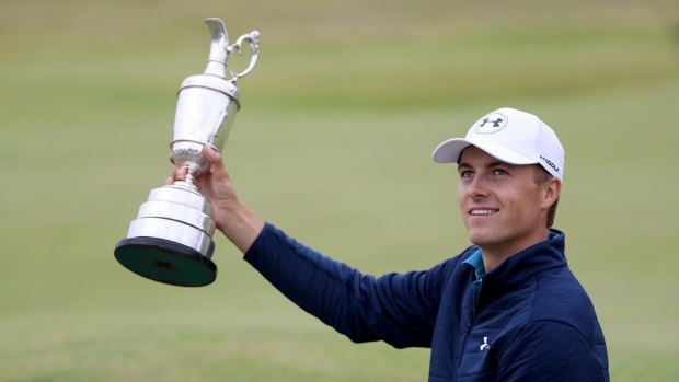 A world away: Jordan Spieth of the United States celebrates with the Claret Jug.
