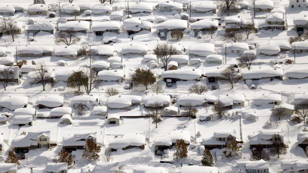 Heavy dump: Homes covered in snow in West Seneca, New York.
