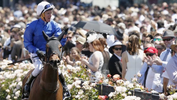 Kerrin McEvoy returns to scale on board Oceanographer after winning the Lexus Stakes on Derby Day at Flemington Racecourse.