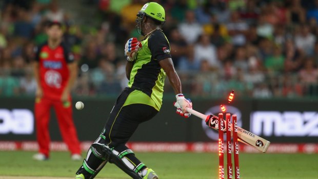 Nasty accident: Andre Russell was struck by a short ball, stumbling onto his own wicket.