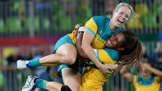 On the rise: Australia's rugby sevens women celebrate their Olymnpic gold in Rio.