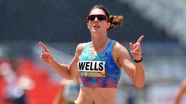 Lauren Wells won 400m hurdles gold.