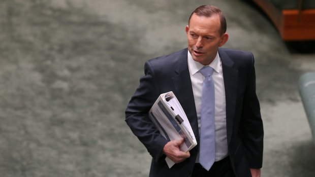 Prime Minister Tony Abbott arrives for Question Time.