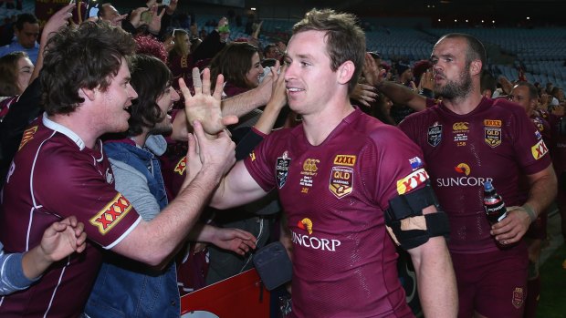 Winners are grinners: Michael Morgan and Nate Myles celebrate with fans after the victory.
