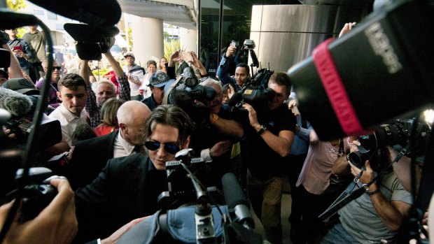 Johnny Depp and Amber Heard receive attention outside court.