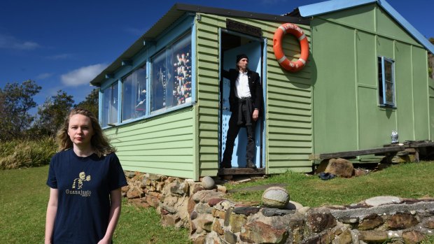 Artist Reg Mombassa with his daughter and artist Lucy O'Doherty in a shack at Little Garie, in the Royal National Park.