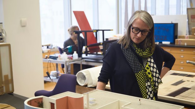 MoMA's head conservator Kate Lewis with a model of Le Corbusier's Villa Savoye.