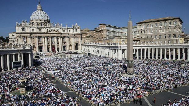 St Peter's Square is crowded with thousands of faithful attending the  canonisation mass by Pope Francis for Mother Teresa.