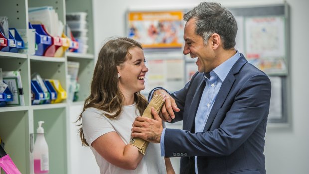 A bond for life: University of Canberra student Sarah Hazell had her right hand re-attached by Ross Farhadieh in what he believes was the procedure of his career.