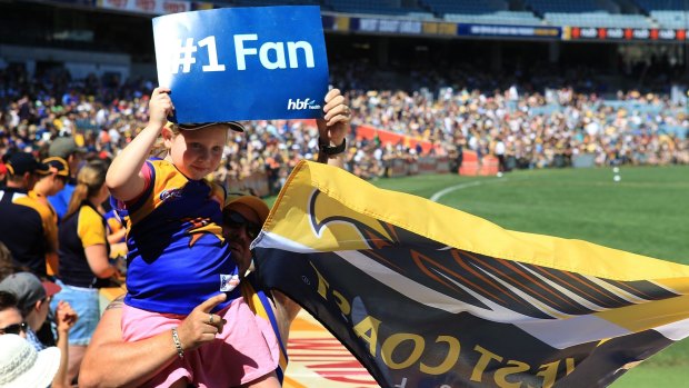 Showing support: Fans attend a West Coast training session during grand final week.