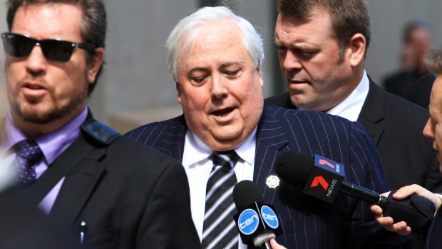 Clive Palmer arrives at Federal Court on Friday to answer questions about the collapse of Queensland Nickel.