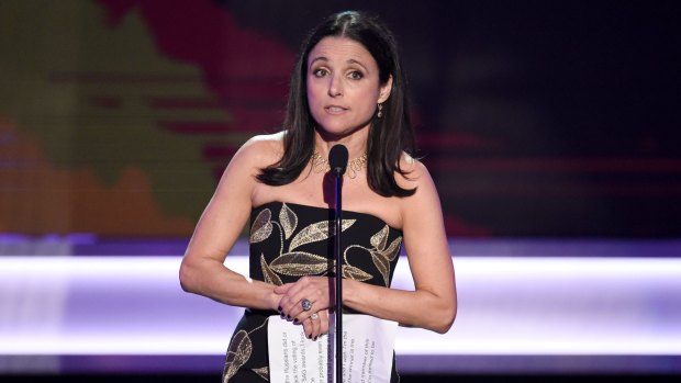 Julia Louis-Dreyfus describes Trump's Muslim ban as a 'blemish' and 'unAmerican' while accepting the SAG award for outstanding performance by a female actor in a comedy series for <i>Veep</i>.