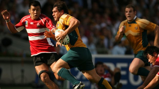 Young George: Smith on the fly for the Wallabies v Japan 10 years ago. 