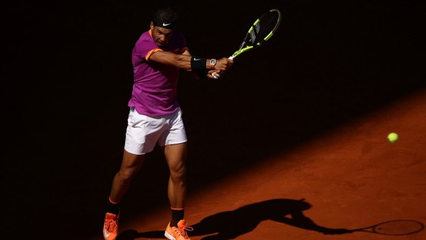 Out of the shadows: Rafael Nadal ends a losing streak against rival Djokovic, remaining unbeaten on clay this season.