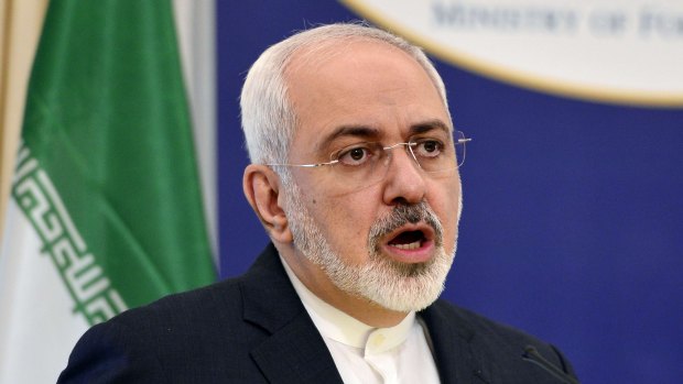 Iranian Foreign Minister Mohammad Javad Zarif talks to the press in Athens, in May as Iran warned global powers against making "excessive demands".