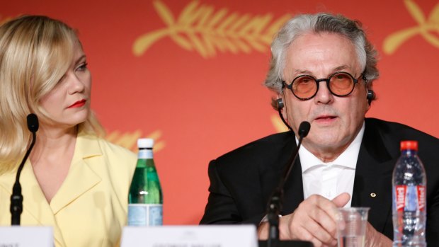 Jury member Kirsten Dunst with jury president George Miller at the opening of the 69th Annual Cannes Film Festival.