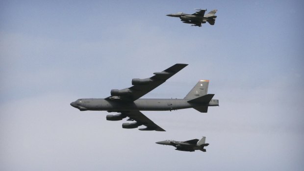 A US Air Force B-52 bomber flies over Osan Air Base in Pyeongtaek, South Korea, on Sunday.