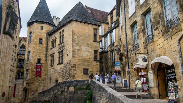 Centuries-old buildings lean together in the old towns of Sarlat.