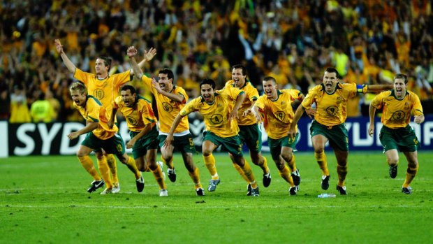 Oh what a night: the Socceroos celebrate after John Aloisi's famous penalty kicked them into a first World Cup in 32 years.