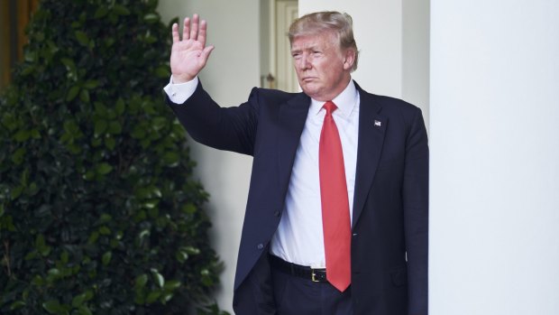 Donald Trump gestures to his White House audience last week after announcing the US would withdraw from the Paris accord.
