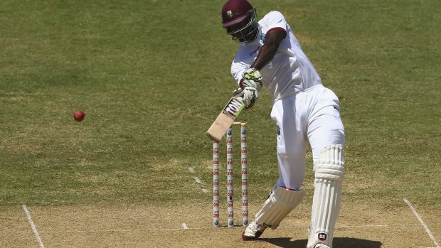 Destructive hitter: Jason Holder of West Indies peppers the boundary during a blistering counterattack.