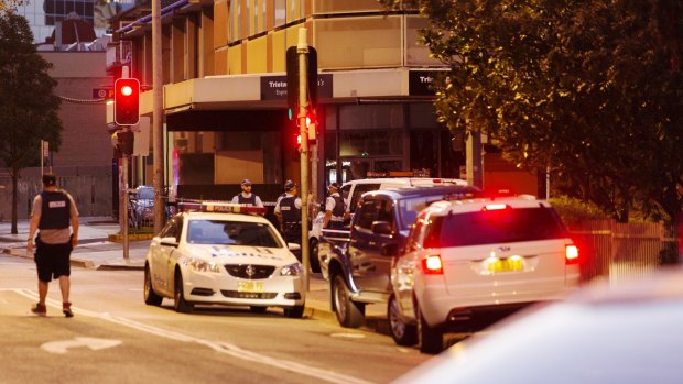 Police block off Charles Street in Parramatta, where two people were shot.