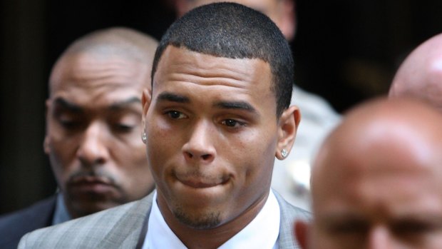 Chris Brown leaves court in 2009 after facing assault charges against former girlfriend Rihanna. 