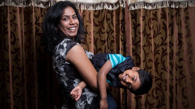 Ambika Sivan, with son Sajan, 4,  wants to help migrants speak up about mental illness. 