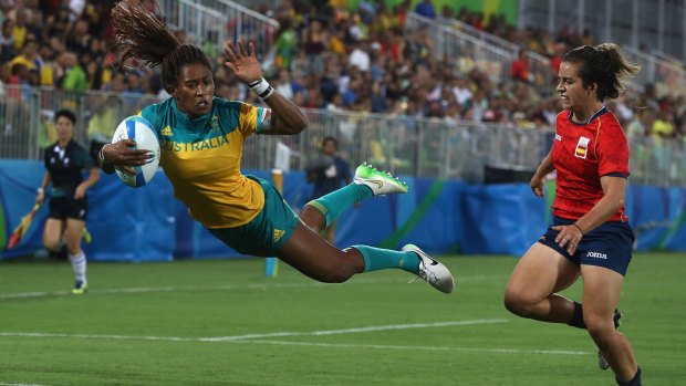 Flying high: Ellia Green scores against Spain at the Olympics.
