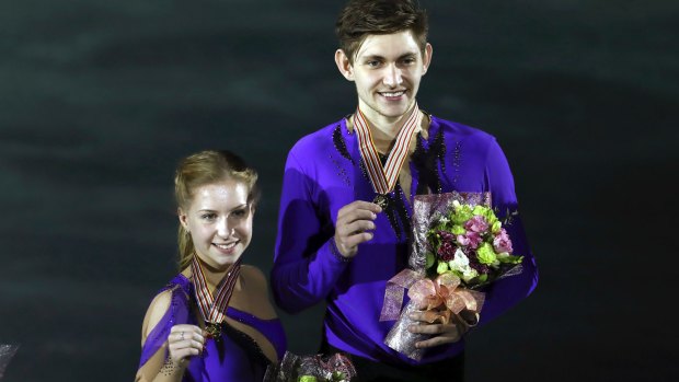 Ekaterina Alexandrovskaya and Harley Windsor celebrate after winning the junior pairs free skating program at the junior world championships in 2017.