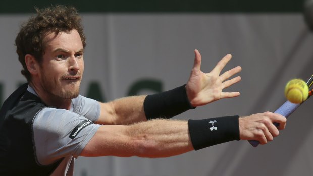 Britain's Andy Murray returns during his match against Nick Kyrgios.
