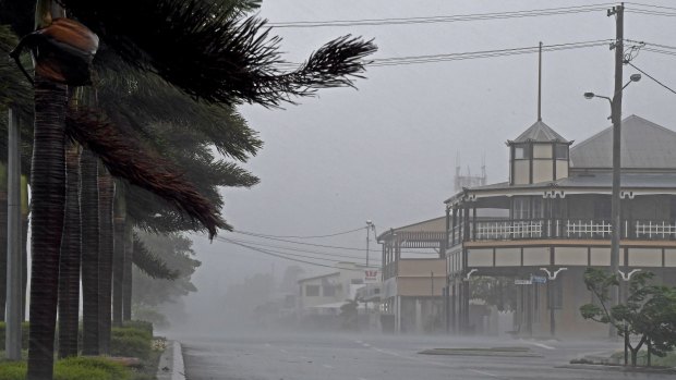 Bowen is deserted and lashed by wind and rain before for the full force of Cyclone Debbie arrives.