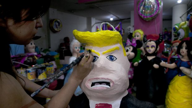 Donald Trump's inflammatory rhetoric about Mexicans has led to the production of pinatas depicting him.