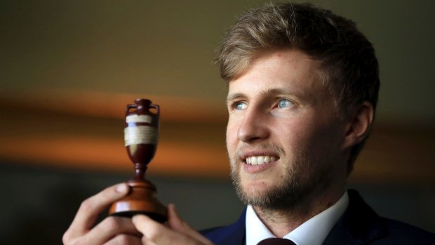 England captain Joe Root holds the Ashes trophy before the team left for Australia.