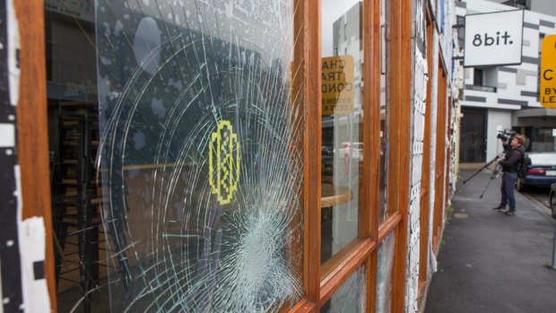 Sixteen window panels were smashed at 8-Bit over the New Year's Eve weekend. The burger restaurant has been targeted again a week later.