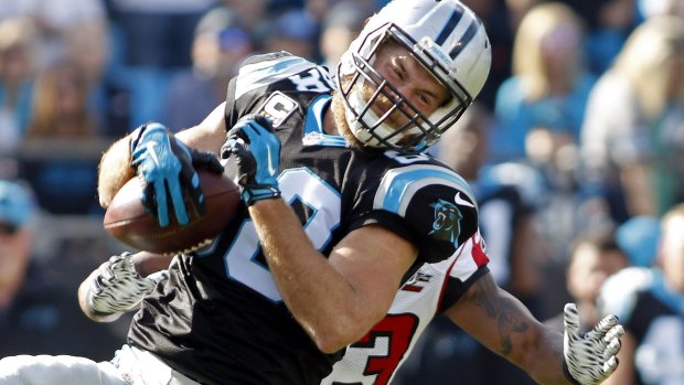 Safety net: Greg Olsen has been Cam Newton's favourite target this year.