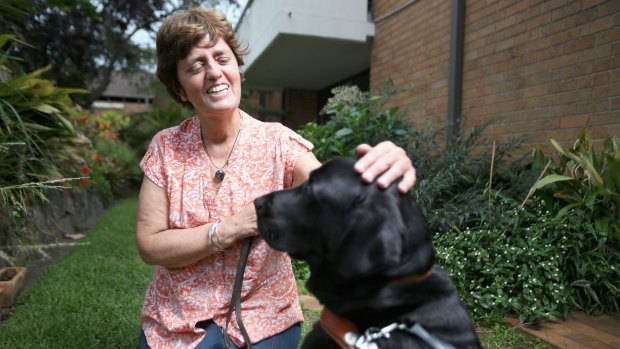 Gisele Mesnage and her guide dog, D'Artagnan. 