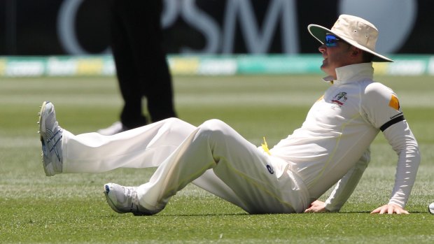 Pain: Michael Clarke appeared to have strained his hamstring on day five in Adelaide.