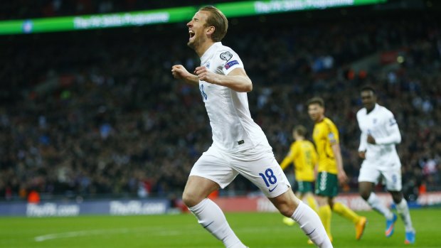 Quick to get numbers on the board: England's Harry Kane celebrates scoring their fourth goal.