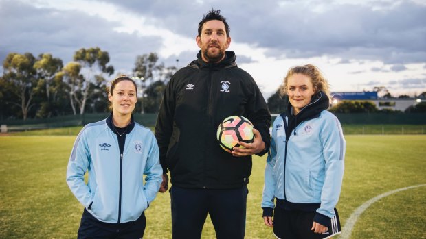 Belconnen United Coach Antoni Jagarinec with players Katie Woodman and Michaela Day.