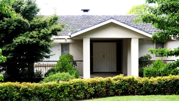 A home in Canberra's Mugga Way, where an alleged murder took place in 2012, is on the market.
